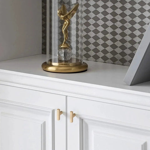 Set Of 30 Solid Single Hole Slim Square Bar Cabinet Pulls In Champagne Bronze Finish for kitchen cabinets, shown installed on white cabinet.
