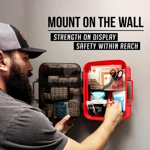 Man installing Comprehensive 400 Piece OSHA ANSI First Aid Kit Type III Class A Medical Supply For Contractors open on wall