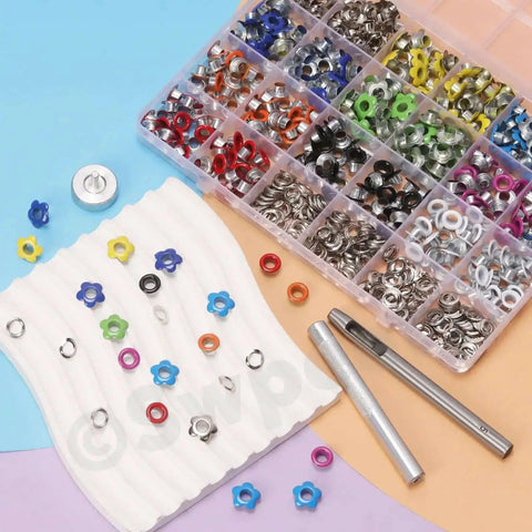 Assortment of multi color 3/16 inch metal flower eyelets and round grommets kit with installation tools for crafting projects.