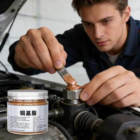 Mechanic applying Copper Based Anti Seize Grease 100g Waterproof Long Lasting Paste For Brake Bolts Exhaust Nuts And Threaded Parts