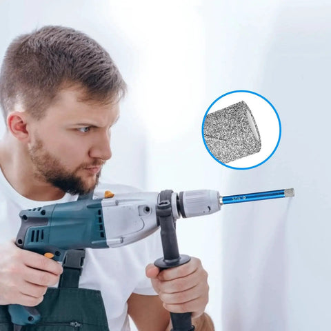 Man using Ten Piece Dry Diamond Drill Bits Set With One Quarter Inch Shank For Ceramic Tile Granite Marble Glass Concrete And Masonry Drilling