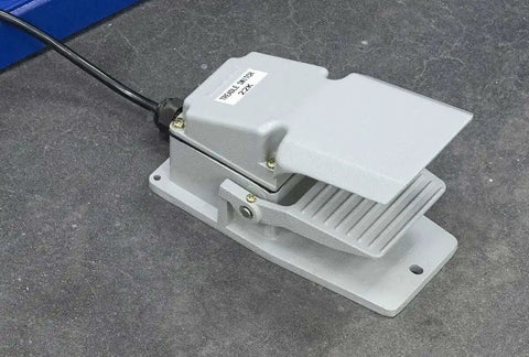 Foot pedal control for Power Bead Roller With Stand For Metal Fabrication, heavy duty design on concrete surface.