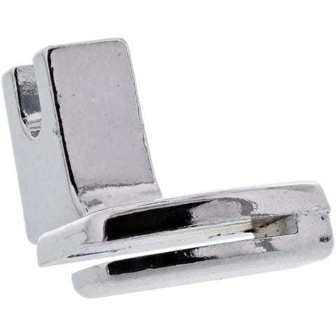 Close-up of chrome sewable shirring gathering presser foot for low-shank sewing machines, used to create soft ruffles.