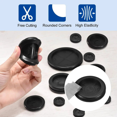 Set Of Four Rubber Grommets For Firewall Cable Protection, Inner Diameter 2 Inches, shown with hand for scale, black color.