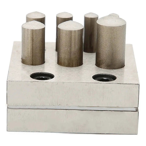 Pro Grade Disc Cutter Set For Jewelry Making, 7 size punch die plates with flat bottom, close-up view of metal cutting tool.