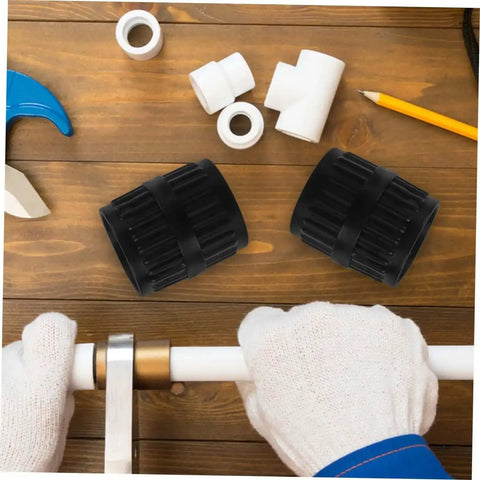 Dual Tubing Reamer Set For No Hassle Deburring, compact inner and outer tools on workbench, gloves holding a pipe