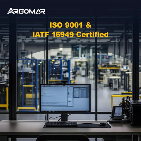 Industrial workspace with computer screen displaying certification details, showcasing ISO 9001 and IATF 16949 Certified facility.
