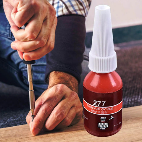Red Thread Locker Gel For All Fasteners And Nuts, Ultra Strong Anaerobic Adhesive That Prevents Loosening From Vibration, Stops Rust, 10ml next to person using screwdriver