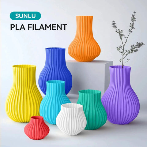 Various colored vases made from Eight Color 1.75mm PLA Filament 250g Mini Spools Bundle for Beginners on display.