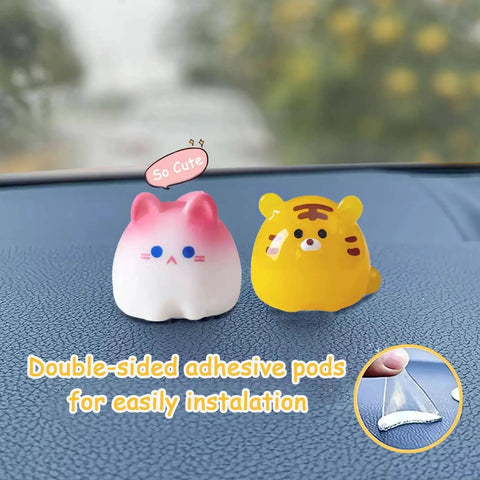 Cat and tiger resin figures on car dashboard with adhesive pods, part of the Giraffe Car Interior Decor Set For Dashboard And Rearview Mirror.