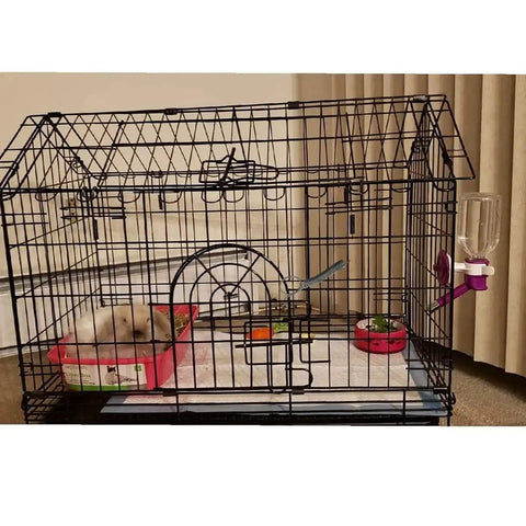 Pet cage with metal bars showing 10 Pack Metal Spring Latch Hooks For Pet Cage Doors And Small Animals securing the door.
