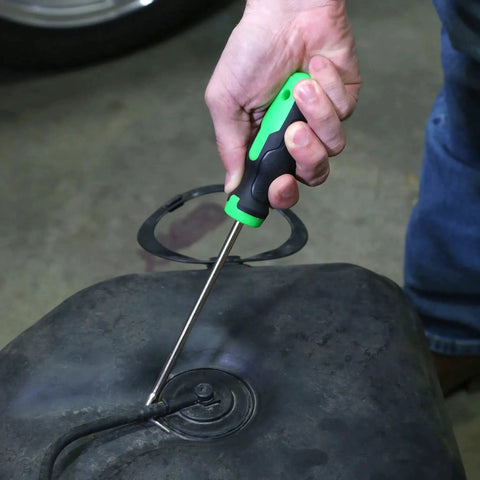 Using 5 Piece Hose Removal Set For Radiator And Coolant Lines With Cotter Pin Tool on a hose in an engine bay