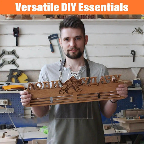 Man holding wooden crafts piece in workshop, surrounded by DIY tools and equipment on walls.