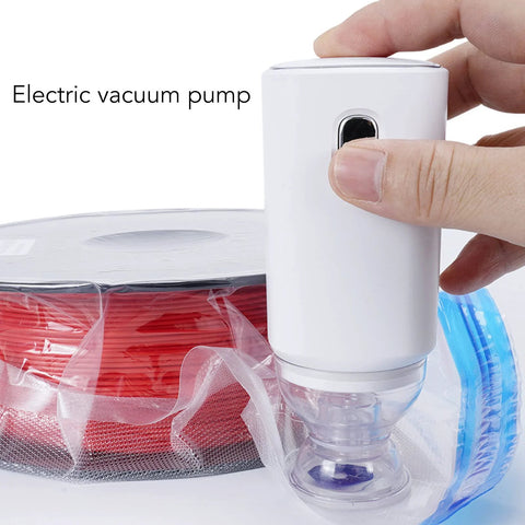 Electric vacuum pump, white cordless handheld device by Amazon, for vacuum storage bags.
