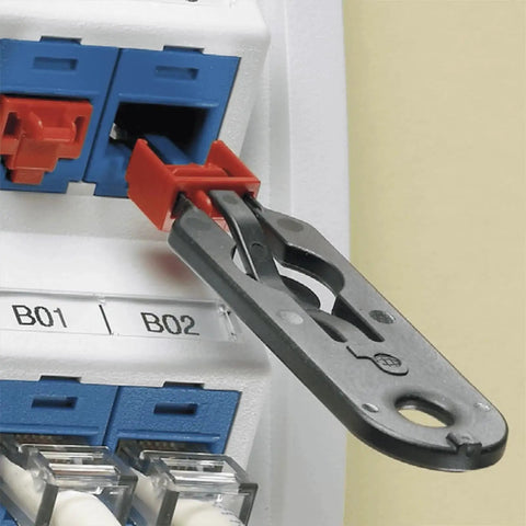 RJ45 Jack Blockout Device Kit With 10 Black Blockouts And Removal Tool in use on an RJ45 port, showcasing security installation.
