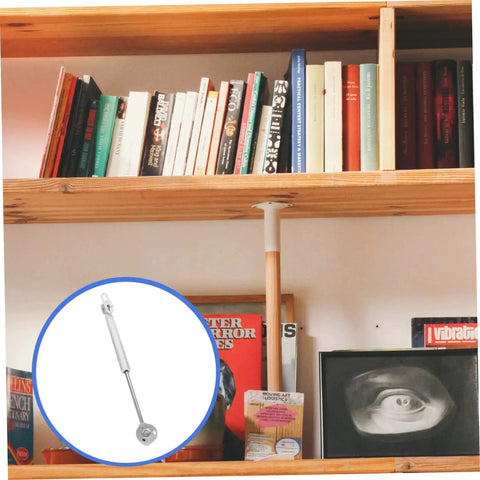 Lid Support Hinge With Soft Close Gas Spring for cabinet doors, shown installed on wooden bookshelf, detailed view inset circle.