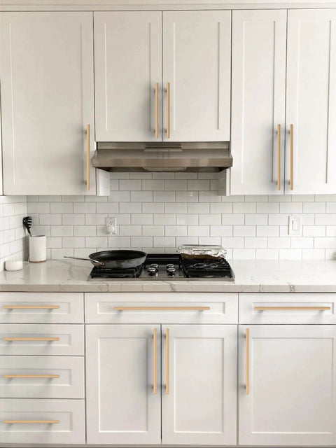 White kitchen with Champagne Bronze Cabinet Pulls 5 Inch 128mm 10 Pack Solid Zinc Alloy Drawer Handles on cabinets and drawers.