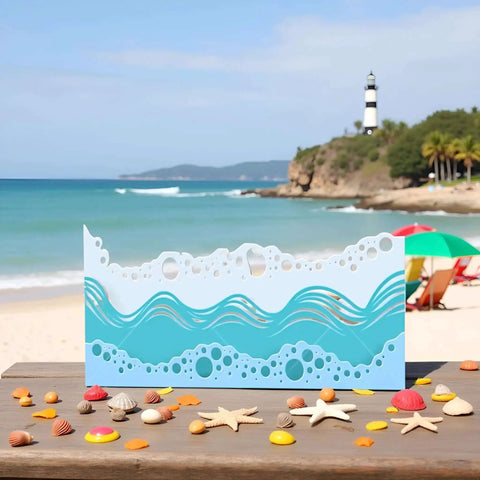 Beach Wave Metal Cutting Dies Set For Scrapbooking And Card Making on a beach background with sea shells and lighthouse.