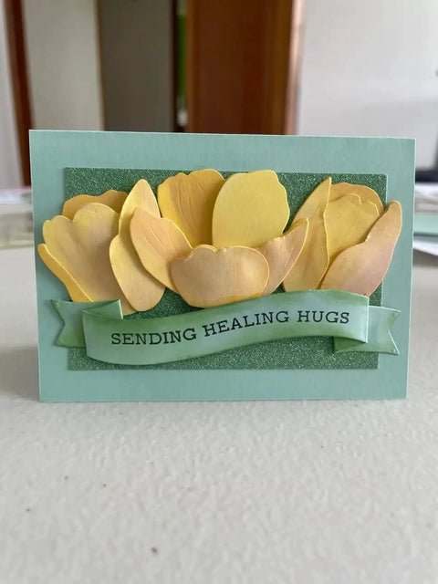 Yellow flower card with 'Sending Healing Hugs' banner, using Dope Flower Die Cut Set For Card Making And Scrapbooking Metal Cutting Dies.