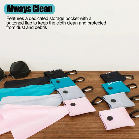 Solid Color Microfiber Eyeglasses Cleaning Cloth Keychain Portable Lens Wipes in various colors on a wooden surface