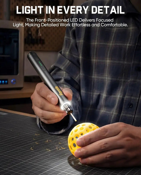 F2 Master Kit Mini Cordless Rotary Tool in use on a yellow 3D-printed object, showcasing engraving with LED light feature
