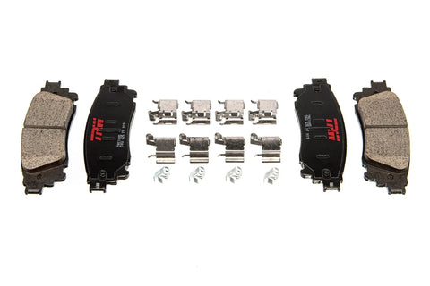 Top-down view of TRW brake pad set TRH0273 with four pads and hardware, black backing plates with red TRW logo.