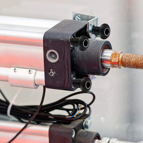 Close-up of machinery with hex socket button head cap screws, highlight on 115 Piece M8 Screws And Nuts Assortment Kit in use for mechanical setup.