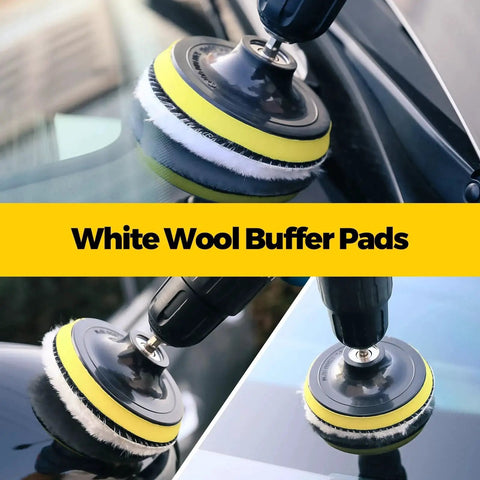Close-up of white wool buffer pads attached to a drill, used for car surface polishing in an automotive setting.