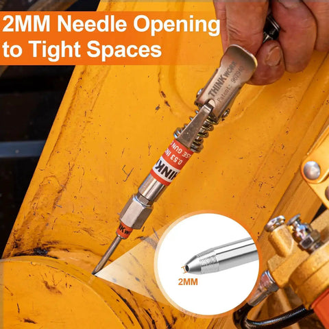 Close-up of grease needle dispenser from 4 Piece Quick Connect Greasing Accessory Kit With 90 Degree Coupler, Grease Needle Dispenser And Nozzles, Cleaning Tool, And Sturdy Portable Storage Box For Reaching Any Grease Fitting On Any Machine in use on a yellow machine part.