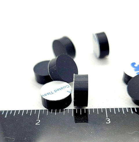 One Half Inch Round Silicone Rubber Bumper Feet Three Sixteenths Of An Inch Thick Adhesive Backed Spacer Pads with ruler