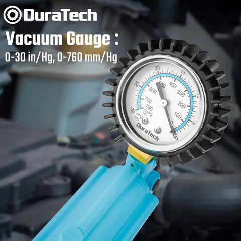 Close-up of blue DuraTech handheld vacuum brake bleeder gauge.