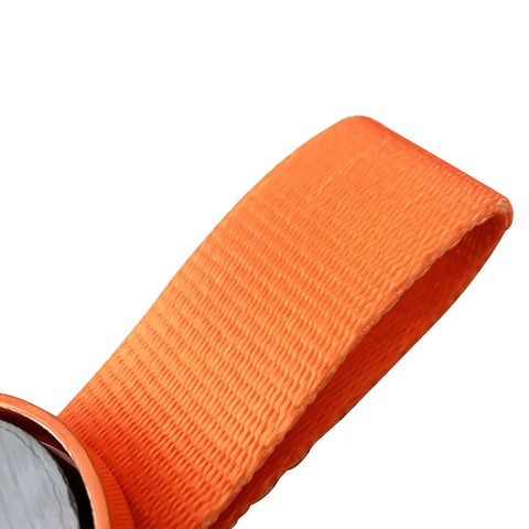 Lockout key with orange heavy-duty nylon strap close-up for SUONE surge brake system