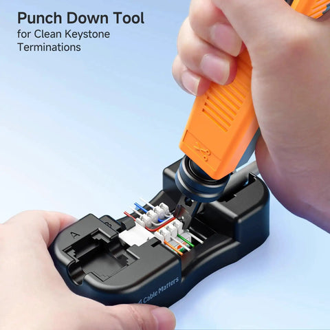 Using punch down tool from 7-In-1 Pro Grade Network Tool Kit for Fast DIYer Ethernet Builds to connect Ethernet cables.