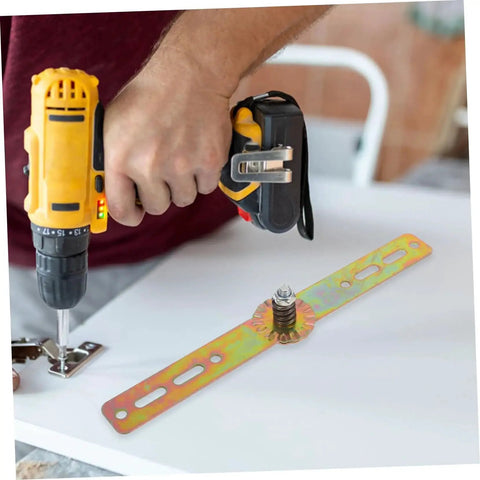 Man installing adjustable angle hinge for furniture with high load capacity using drill, shows DIY hardware in action
