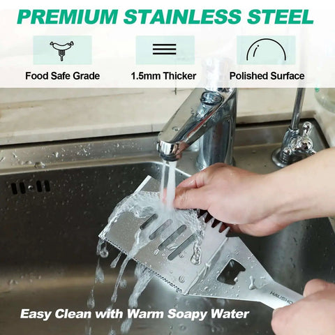 Heavy Duty BBQ Tool Set With Spatula, Fork And Tongs In Premium Stainless Steel being washed under tap in sink.