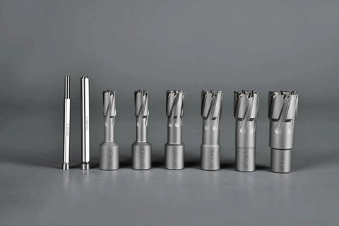 Carbide Annular Cutter Set For Drill Press By JESTUOUS 8 Piece Weldon Shank Three Quarters Inch Cutting Diameter And One And Three Eighths Inch Cutting Depth From One Half Inch To One And One Sixteenth Inches With Two Flat TCT Bits And Pilot Pins displayed in a row.