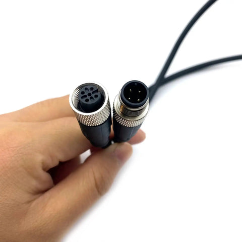 Hand holding M12 4 Pin Male To Female Connector Cable 5 Meter IP67 Waterproof A Code Straight Profibus Fieldbus Sensor Cable