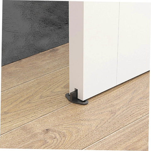 Sliding Barn Door Floor Guide Rail Low Profile Hardware Swing Stopper installed on wooden floor, black steel, preventing door shake.