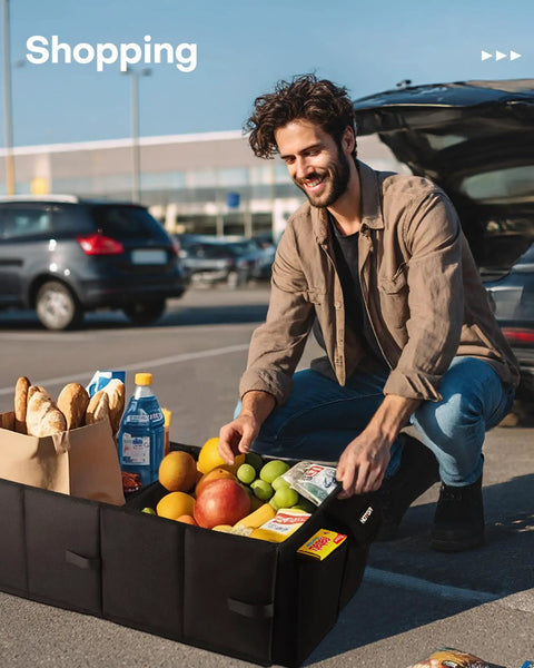 Foldable Car Trunk Organizer For SUVs And Sedans With Two Large Compartments And Six Mesh Pockets keeps groceries organized in black.