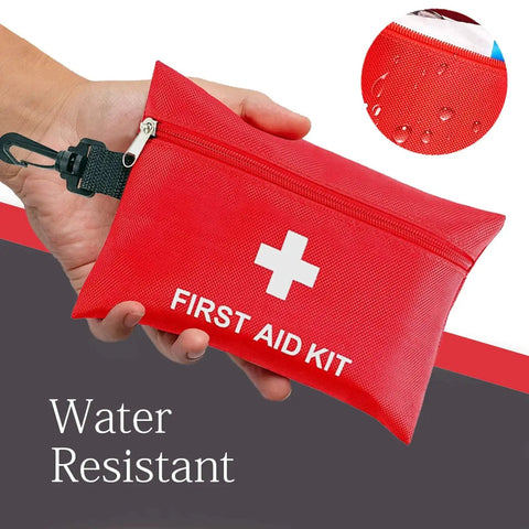 Hand holding Compact 97 Piece Travel First Aid Kit For Cars Home School Sports Camping And Hiking Waterproof Lightweight Ready To Grab And Go