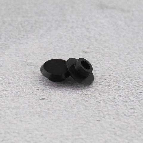 50 Pack Socket Head Screw Cover Caps For M6 Allen Screws, Black Hex Head Plastic Protectors on gray surface