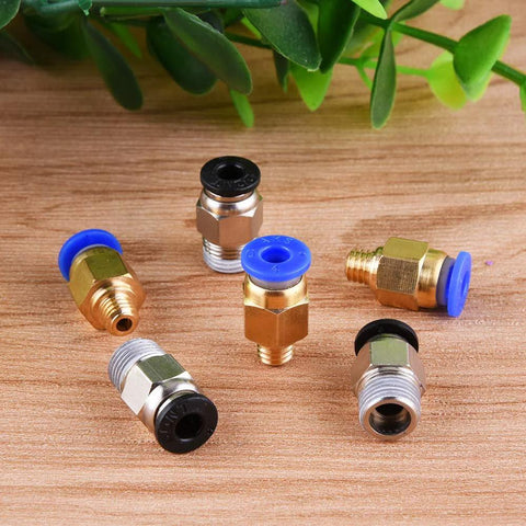 Six PC4-M6/PC4-M10 brass push-fit fittings with blue and black seals for PTFE tubing used in 3D printers.