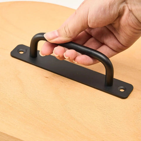 Black Aluminum Alloy Barn Door Handle Pull For Cabinets And Sliding Doors on a wooden surface, easy grip, 5.82x0.98x1.41 inches