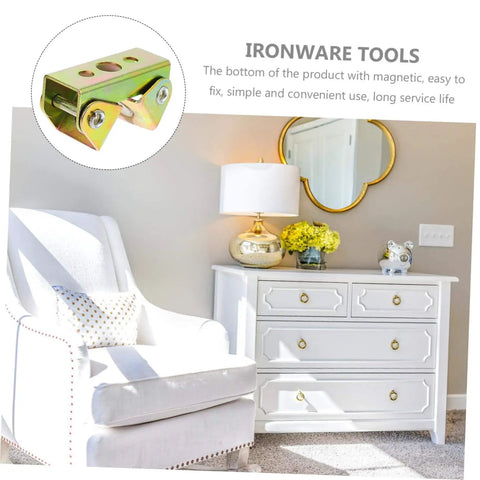 Living room with white armchair and dresser, featuring golden decorative accents and floral arrangement, promoting Ironware Tools.