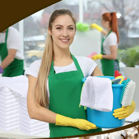 Smiling woman holding cleaning supplies with 200 Pack Cotton Terry Cleaning Cloths 14 by 18 Inches White Bulk nearby