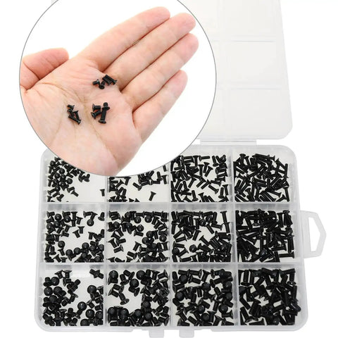 Beefy 560 Piece Black Carbon Steel Laptop Screw Set For Dell Samsung HP Sony Laptops in hand and organized in case