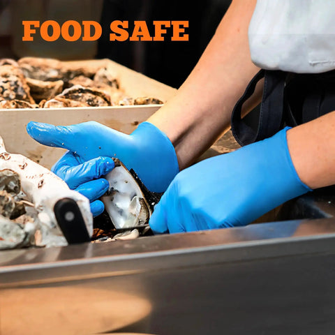 Person wearing Six Mil Nitrile Exam Gloves Large Box Of 100 Latex Free Powder Free Heavy Duty while shucking oysters