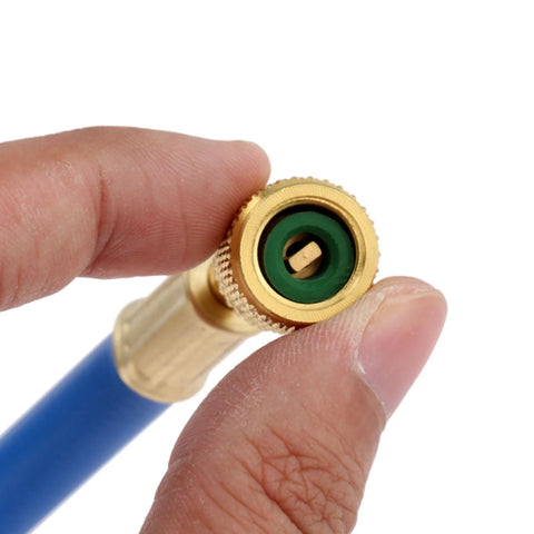 Brass refrigerant A/C charging hose connector (1/4 SAE) with green seal on blue hose, knurled tip