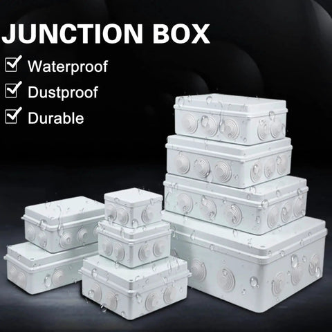 Several stacked Heavy Duty IP65 Weatherproof Junction Box ABS Plastic Electrical Enclosures in white with cable entry holes.