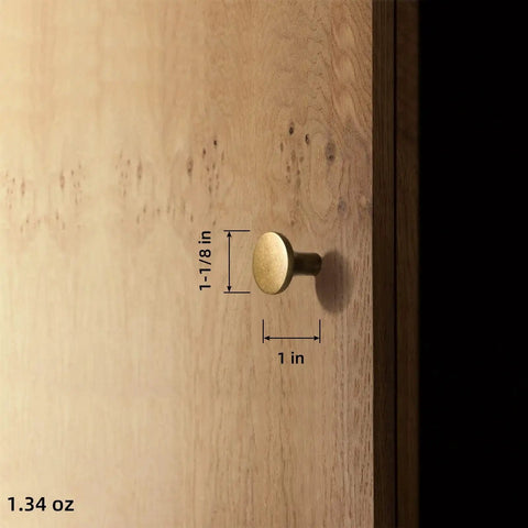 Antique Brass Cabinet Knobs 6 Pack Minimalist Round Hardware For Cabinets And Dressers 1-1/8 Inch Diameter installed on wood